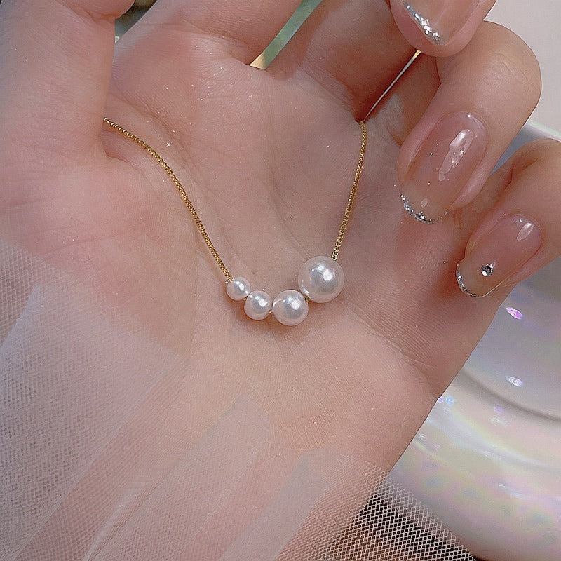 "イヴェット™ - クラシックパールネックレス" can be rewritten as "イヴェット™ - クラシックパールのネックレス".