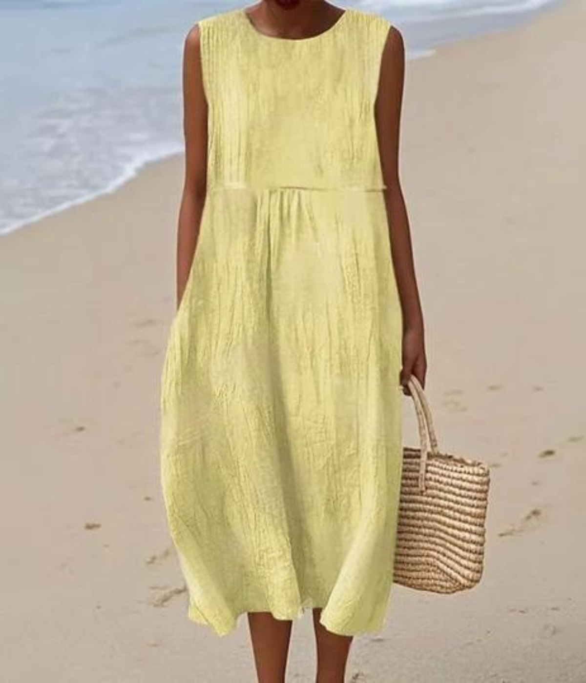 黄色のノースリーブロングドレス