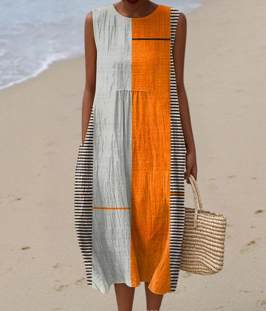 白地にオレンジのノースリーブドレス