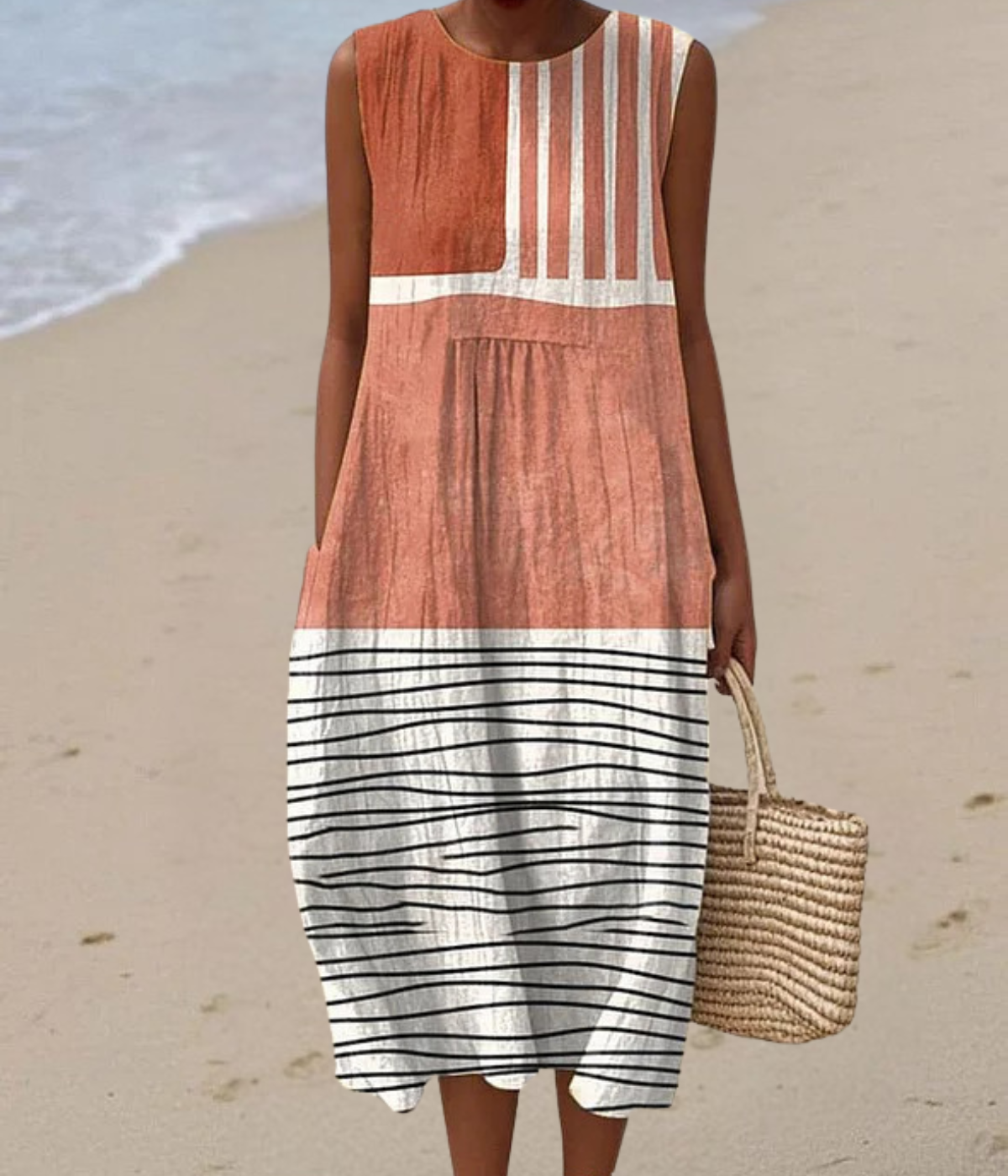 ライトオレンジのノースリーブロングドレス