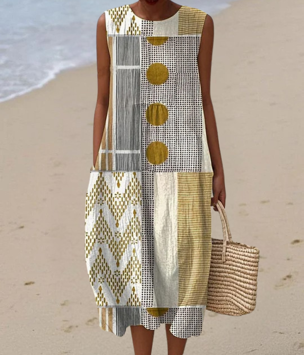 イエロー柄のノースリーブロングドレス