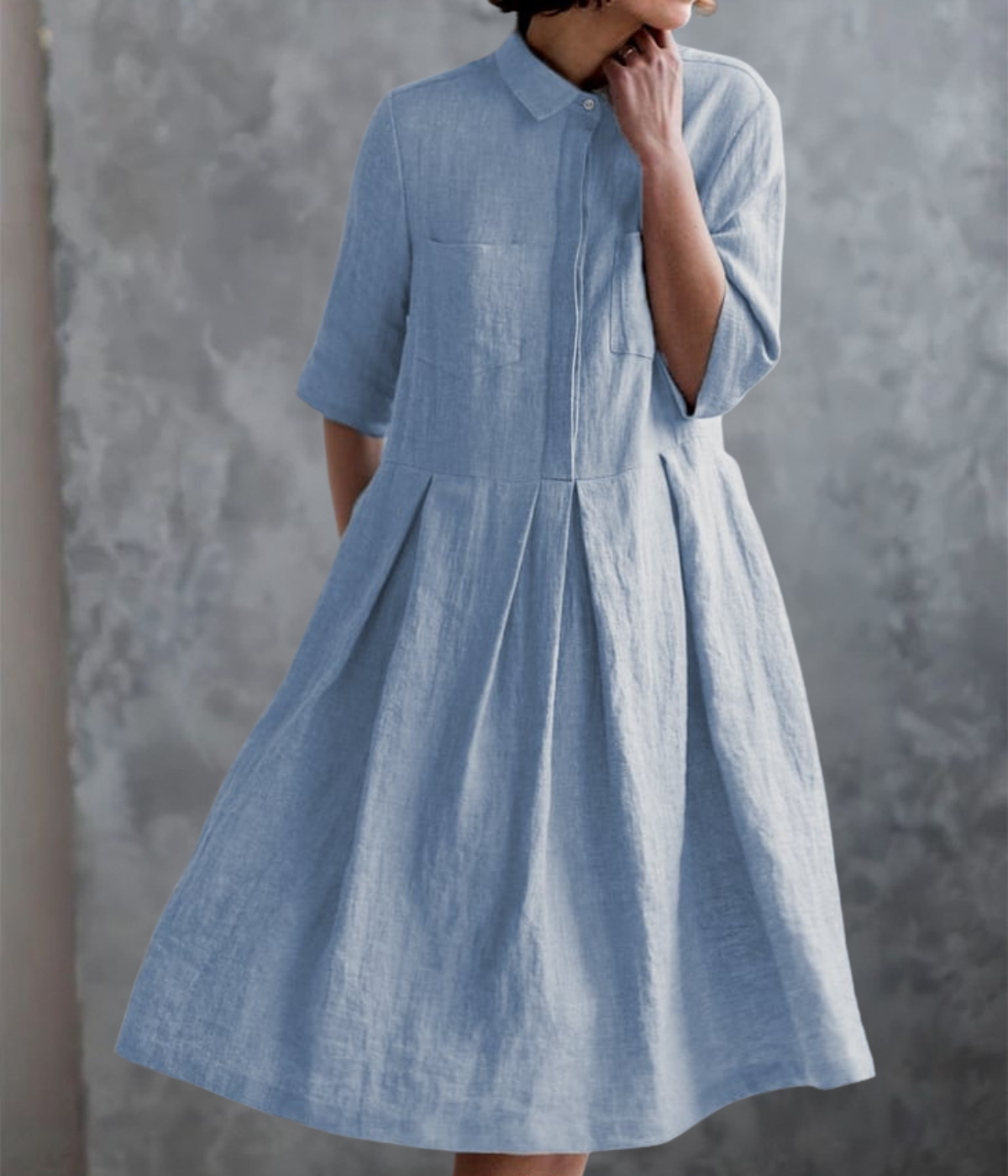 ライトブルーのダブルポケットドレス