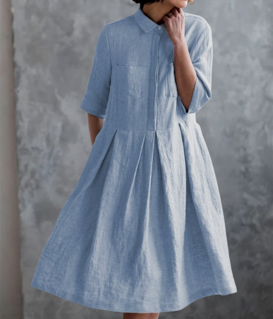 ライトブルーのダブルポケットドレス