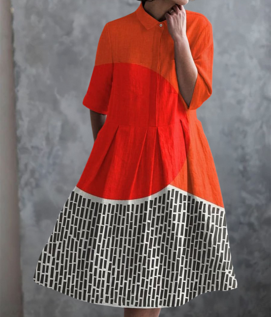 オレンジ柄のダブルポケットドレス